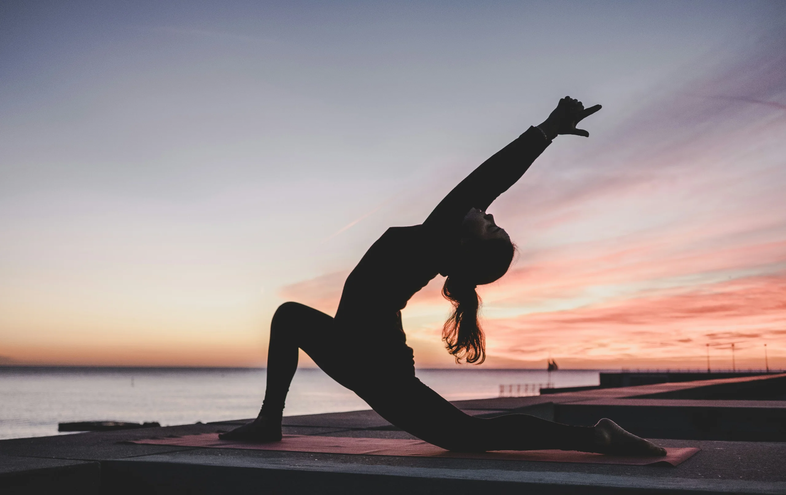 Woman practicing restorative yoga