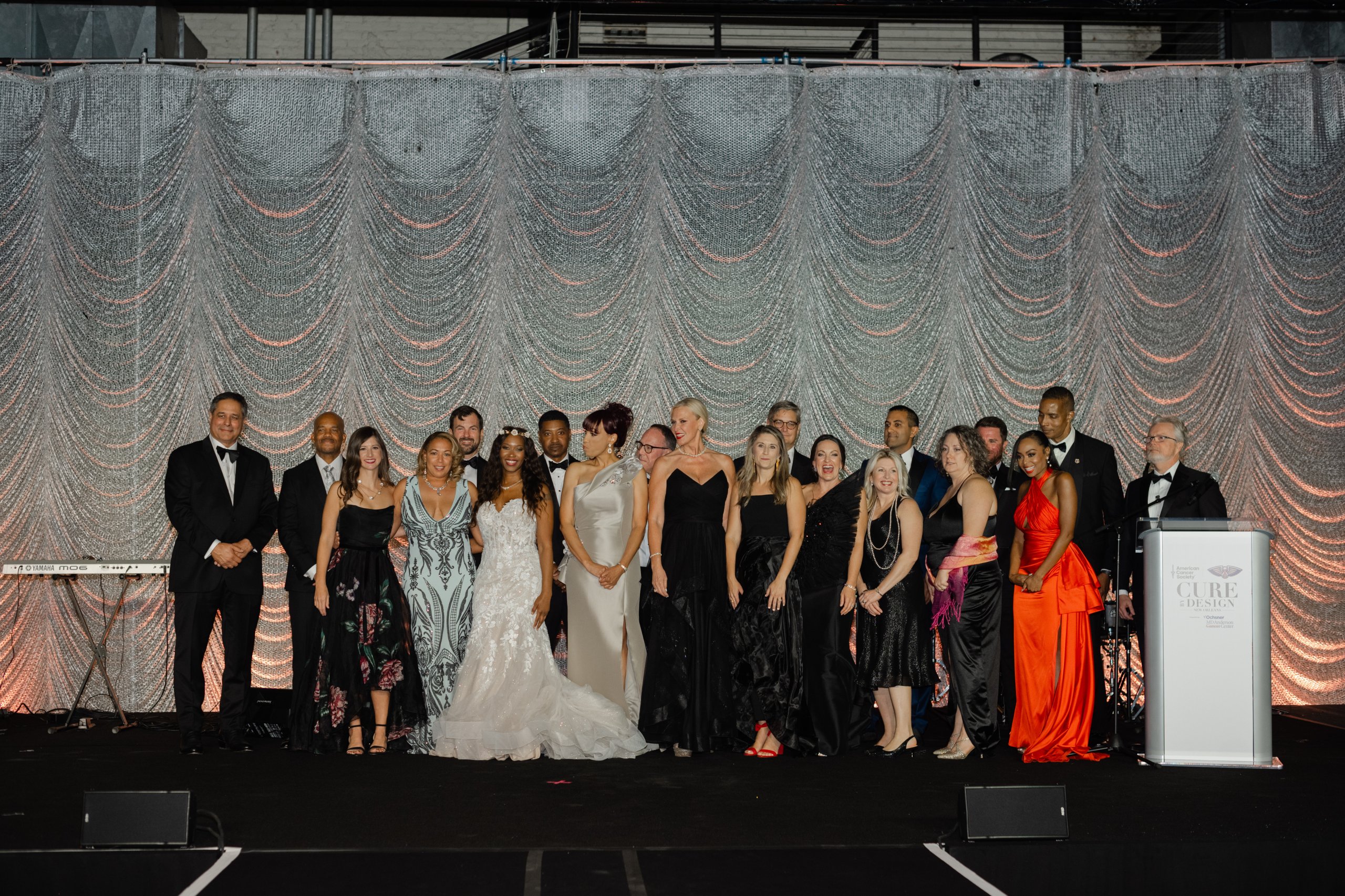 Tancharelle Washington speaking on stage with energy