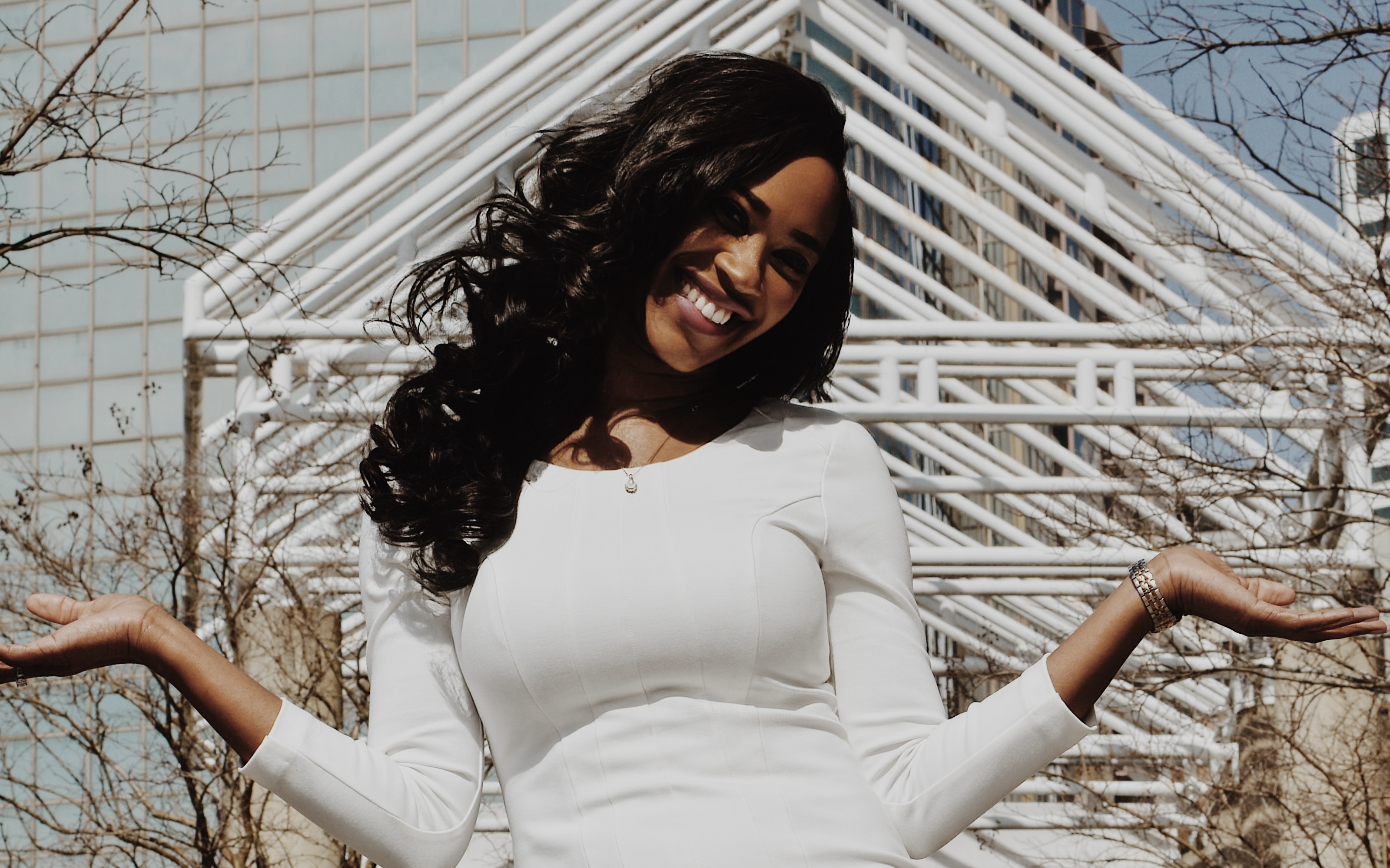 Tancharelle Washington, founder of Courage Over Cancer, smiling.